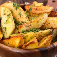 Baked-Potato-Wedges-Topped-With-Cheese-Recipe